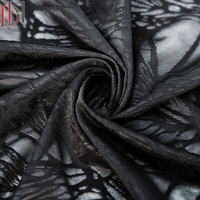 Buy 88% Polyester 12% Spandex Fabric , White Black Ice Silk Petal Jacquard Clothing Fabric online manufacture